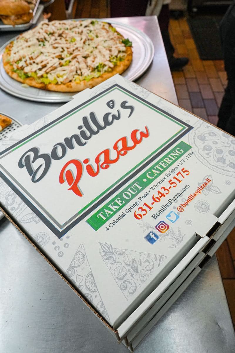 A Bonilla's Pizza takeout box, closed