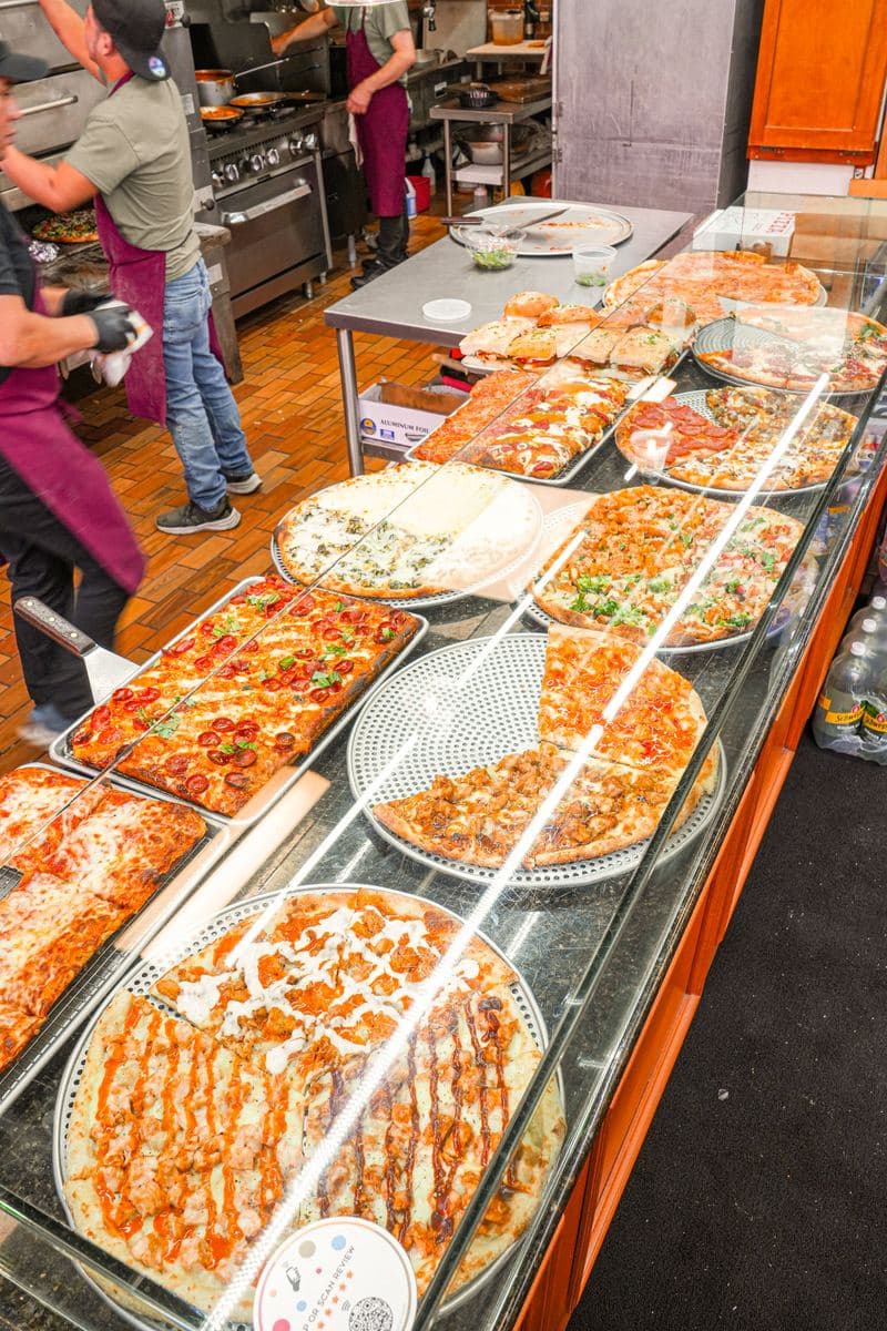 Bonilla's front counter with pies lined up under the display glass