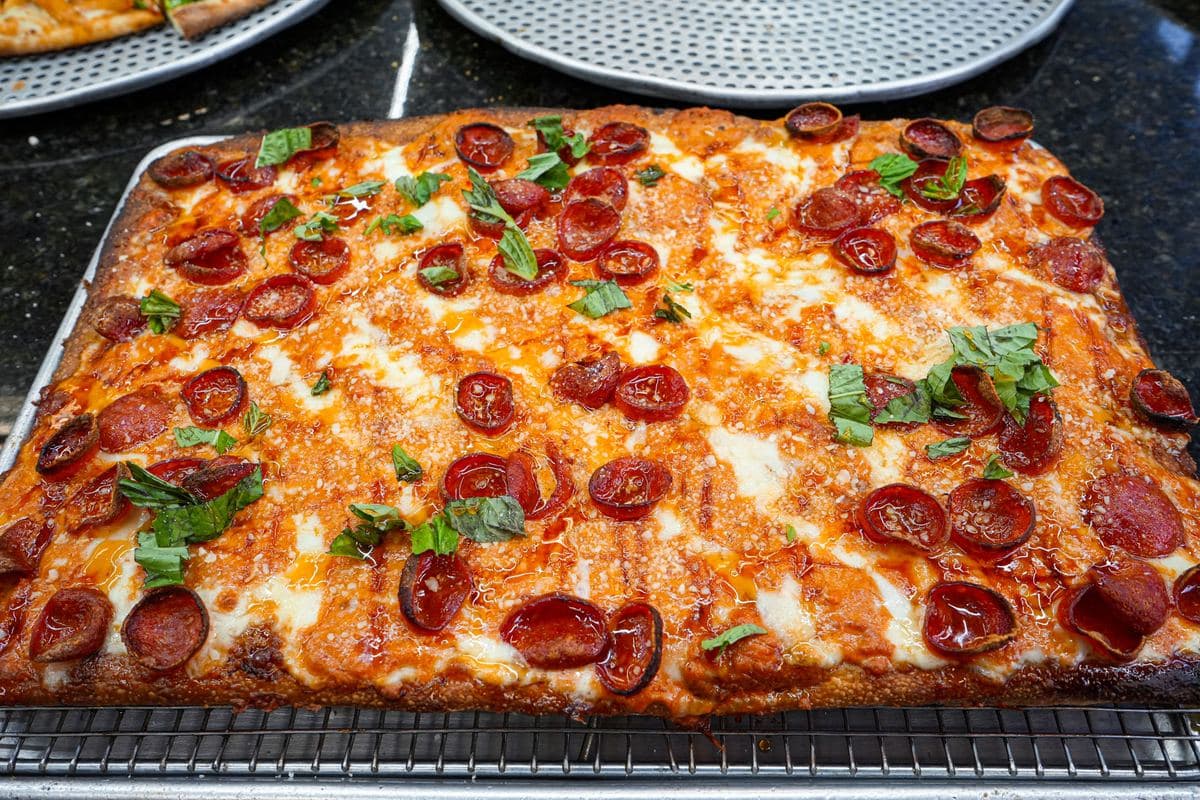 Pepperoni Sicilian finished with fresh basil