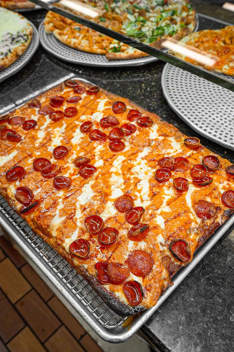Full tray of pepperoni Sicilian, cup pepperoni edge to edge