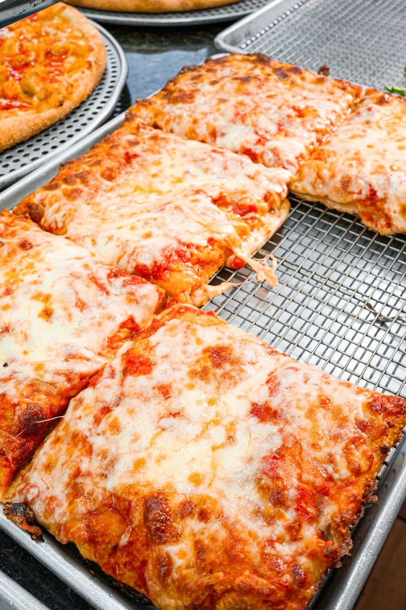 Cut squares of cheese Sicilian cooling on a wire rack