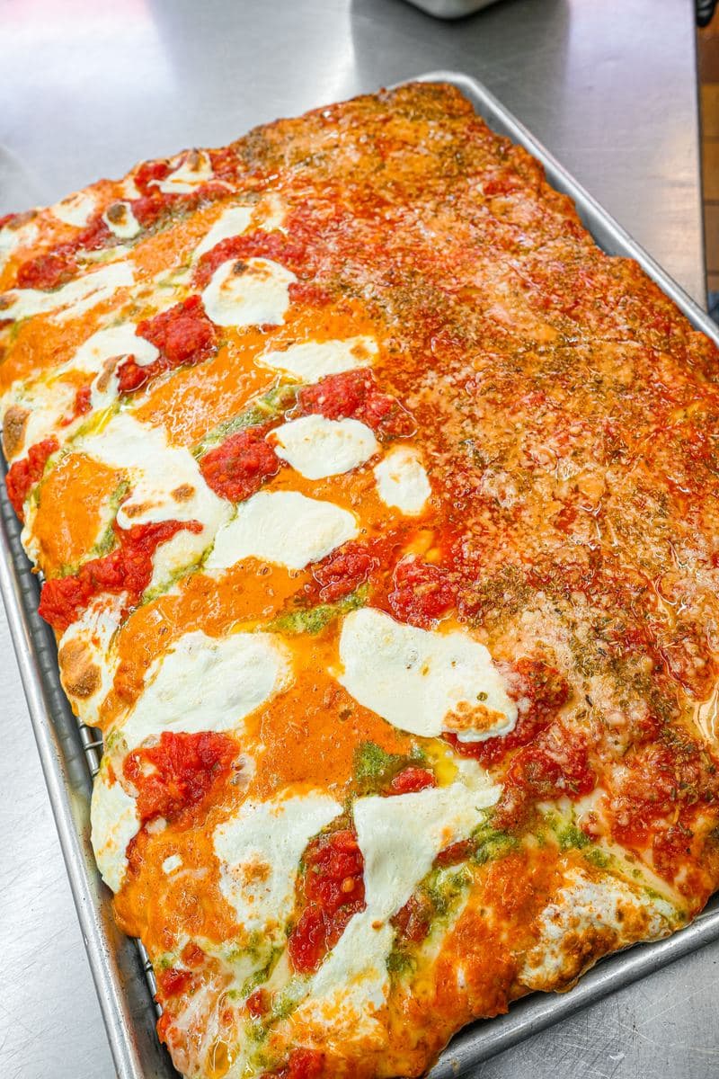 Trio Sicilian with vodka sauce, pizza sauce, pesto and fresh mozzarella